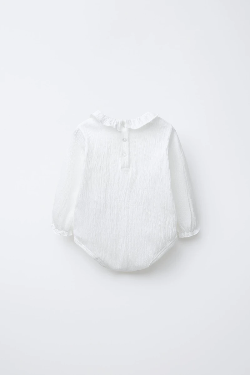 TEXTURED BODYSUIT