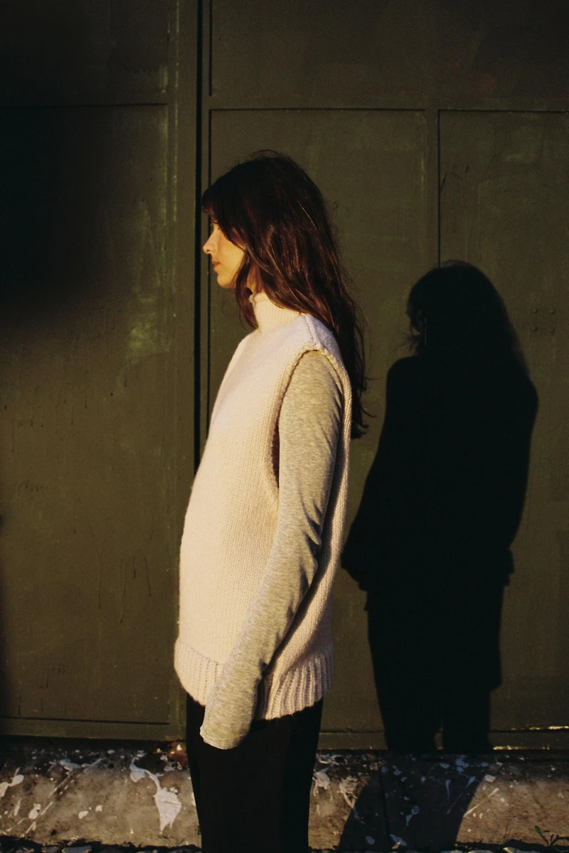 ASYMMETRIC KNIT VEST