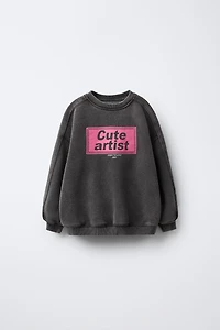 WASHED EFFECT PRINTED SWEATSHIRT