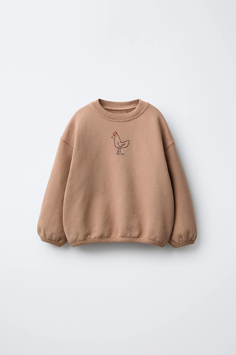 SWEAT COQ BRODÉ