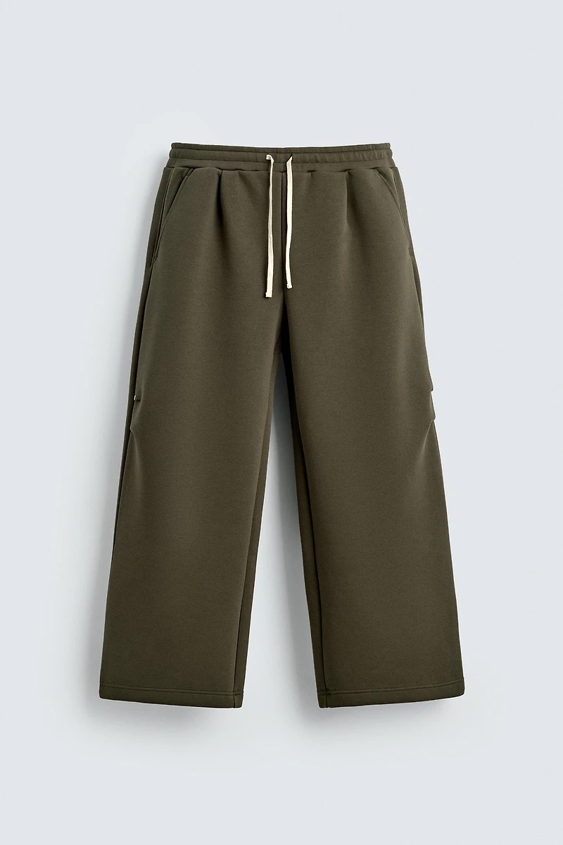 WIDE FIT NEOPRENE EFFECT PANTS WITH STUDS
