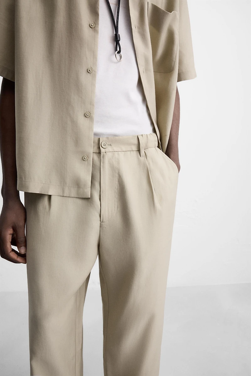 RELAXED FIT FLOWY PANTS