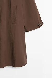 Oversize cape trench with neck detail