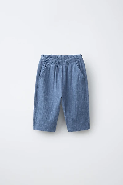 PANTALON TEXTURÉ EN MATIÈRES VARIÉES