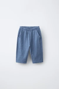 PANTALON TEXTURÉ EN MATIÈRES VARIÉES