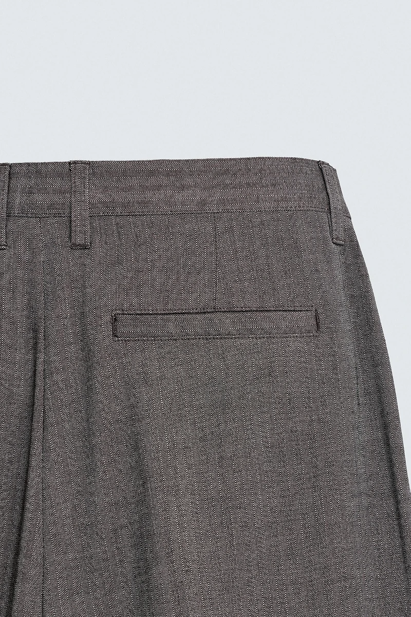 HERRINGBONE SUIT FLARE FIT PANTS