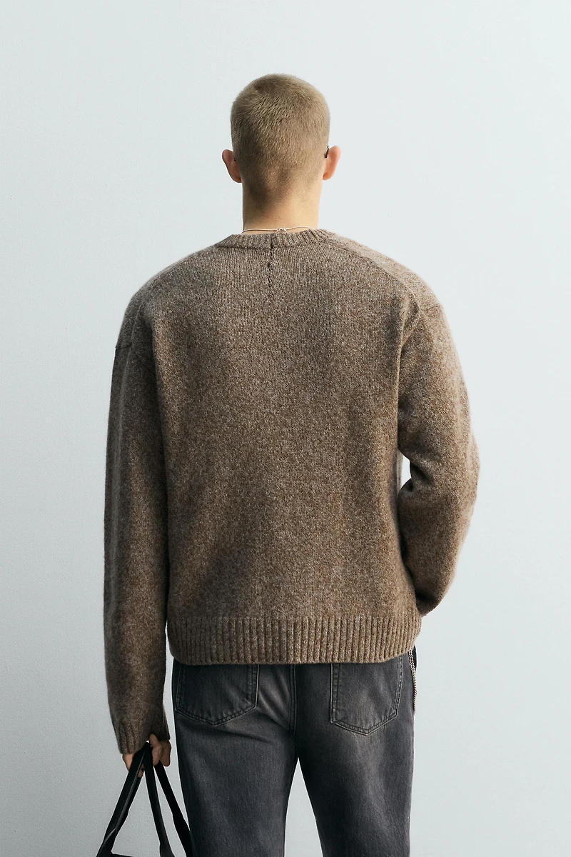 LIMITED EDITION V-NECK SWEATER