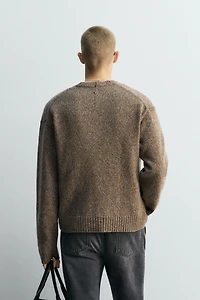 LIMITED EDITION V-NECK SWEATER