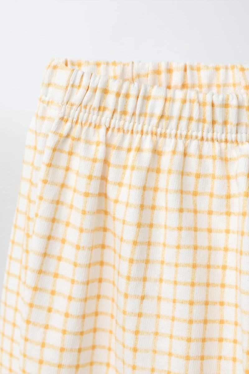 PANTALON À CARREAUX
