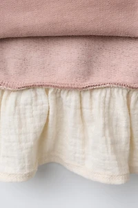 CONTRASTING FLORAL SWEATSHIRT