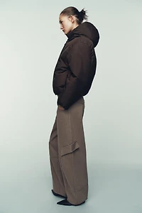 ANORAK MATELASSÉ À CAPUCHE DÉPERLANT COUPE-VENT