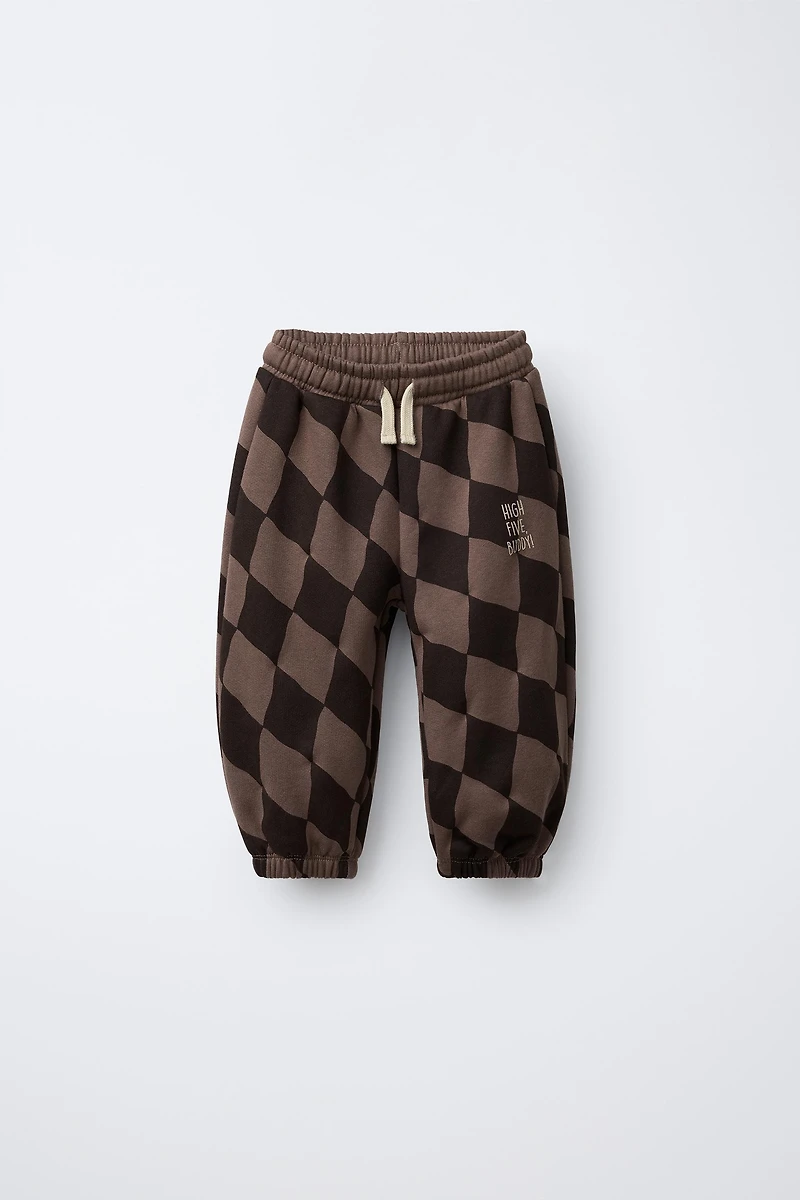 PANTALON EN MOLLETON À LOSANGES