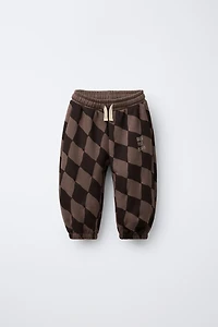 PANTALON EN MOLLETON À LOSANGES