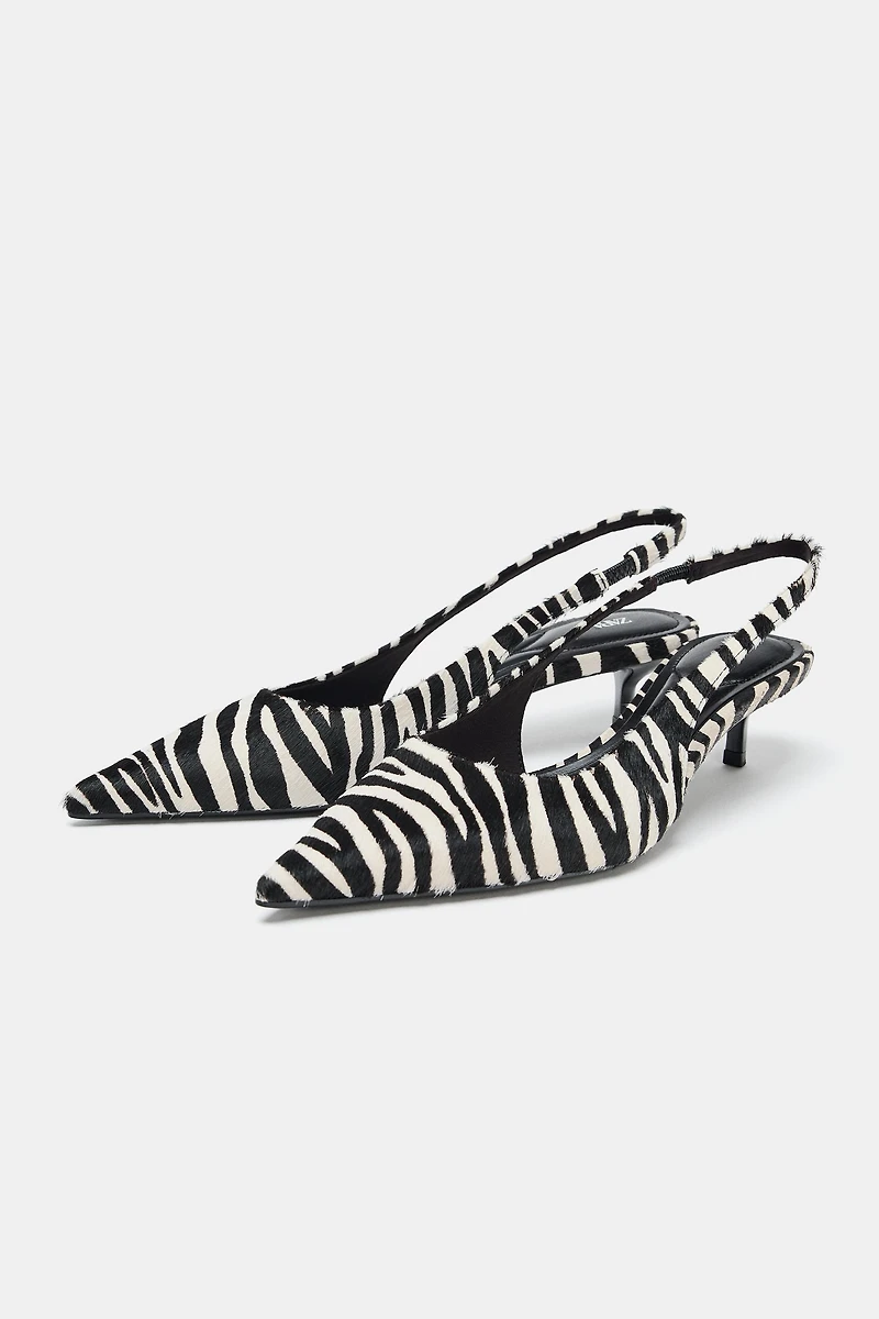 CHAUSSURES EN CUIR À IMPRIMÉ ANIMALIER