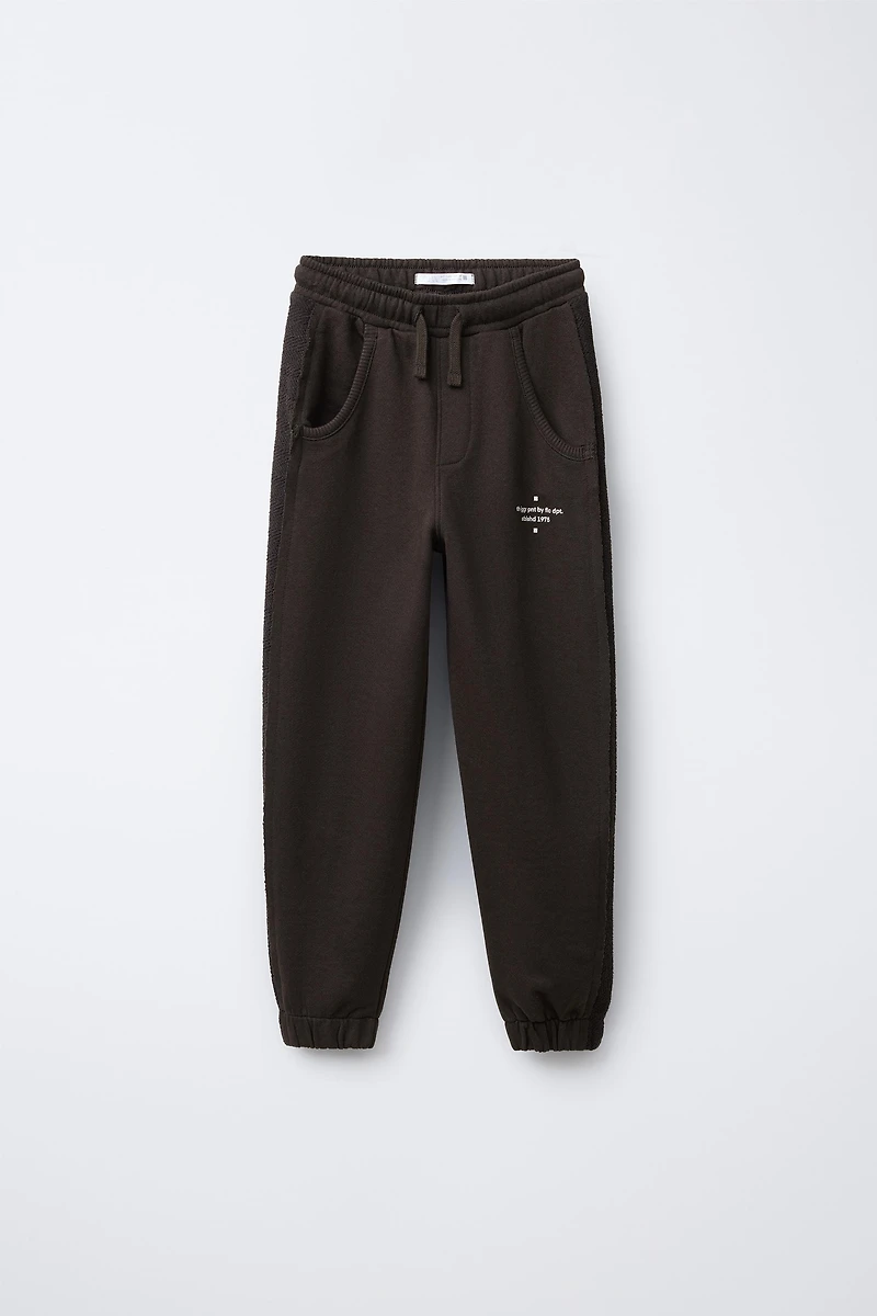 PANTALON DE JOGGING EN MOLLETON ET MATIÈRES VARIÉES
