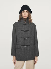 Mid-length coat with horn toggle