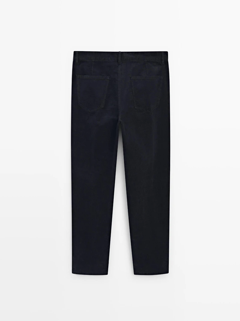 Faux jean en velours côtelé coupe slim
