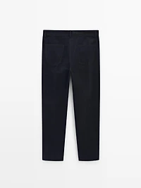 Faux jean en velours côtelé coupe slim