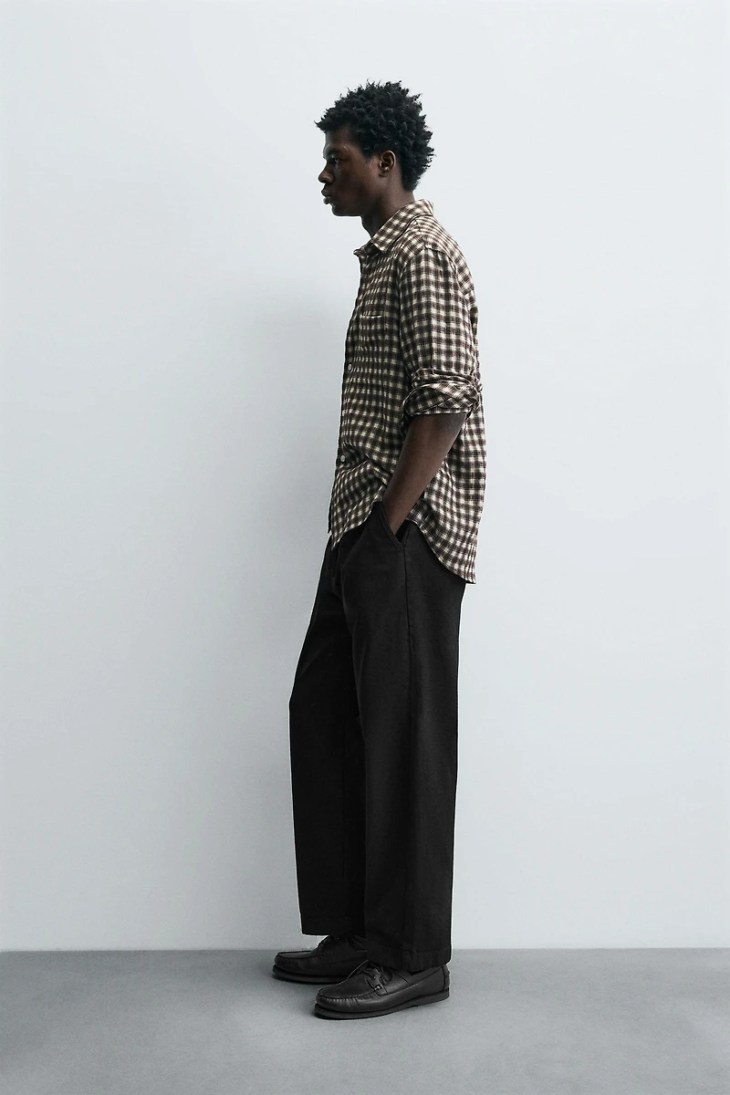 PLEATED RELAXED FIT PANTS
