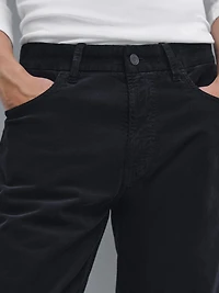 Faux jean en velours côtelé coupe slim