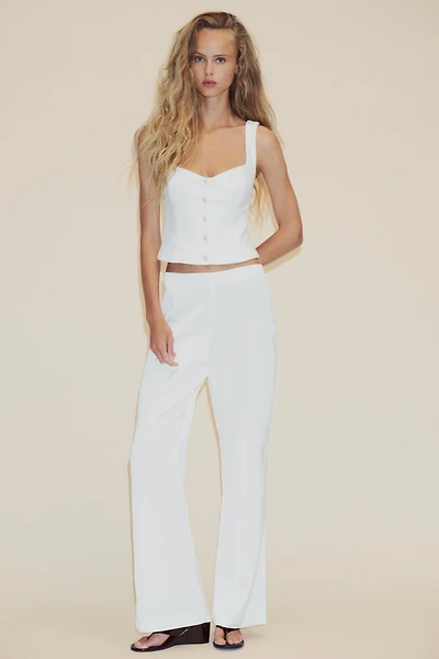 TOP EN CRÊPE À BOUTONS BIJOUX