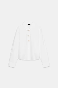 CHEMISE EN POPELINE À BOUTONS BIJOUX