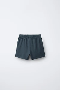 ENSEMBLE DE JOGGING POLO ET BERMUDA UNIS