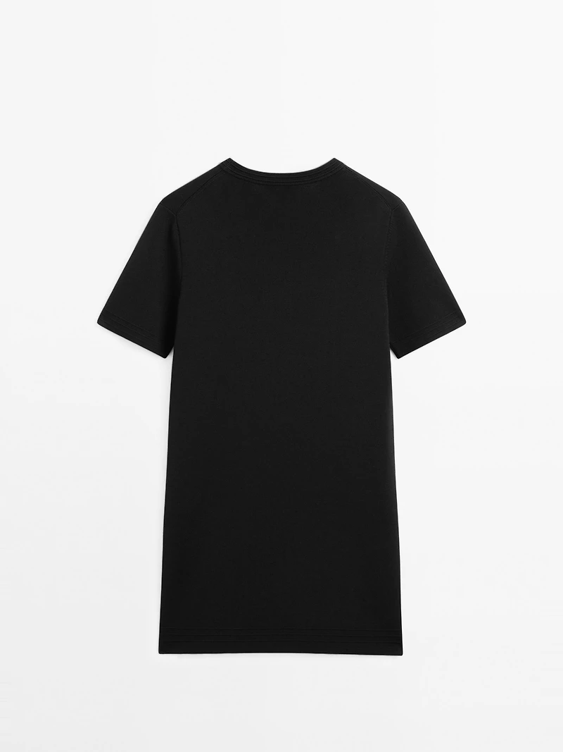 Short knit dress with side button details