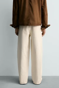 RELAXED FIT PLEATED PANTS
