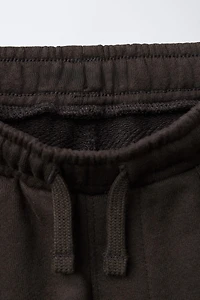 PANTALON DE JOGGING EN MOLLETON ET MATIÈRES VARIÉES