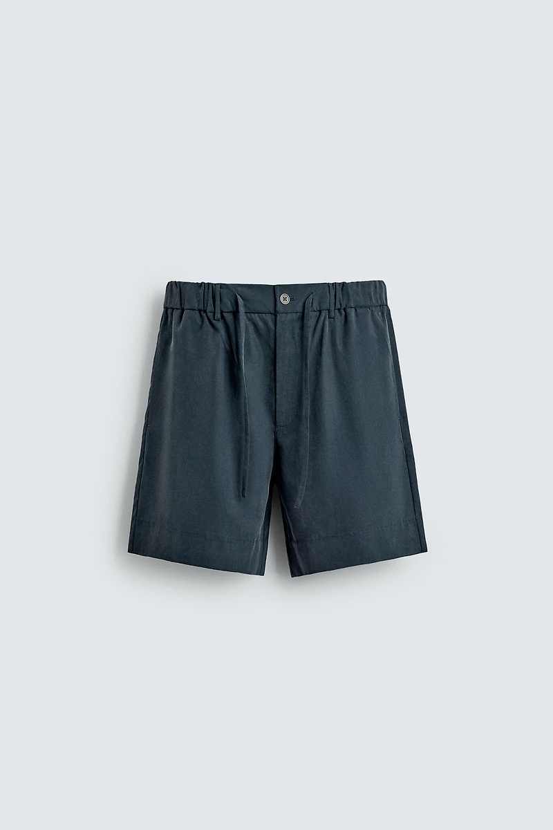WASHED EFFECT RELAXED FIT SHORTS