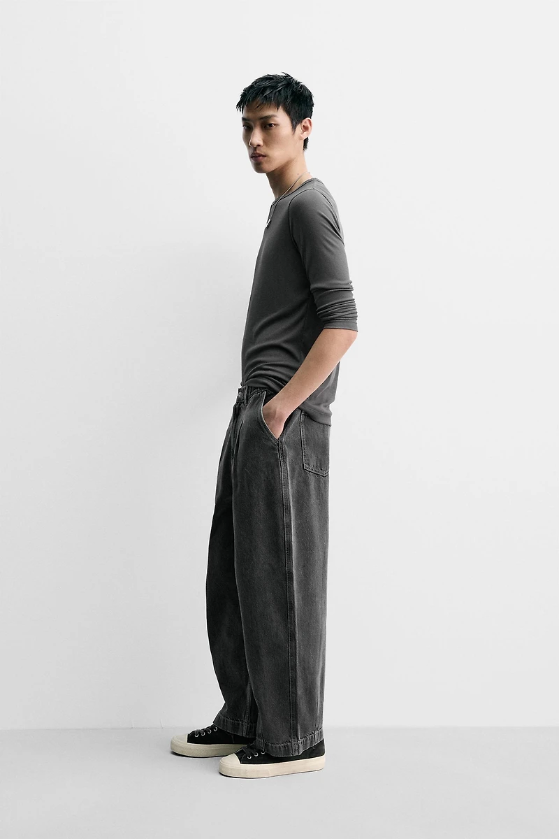 PLEATED WIDE FIT DENIM CHINO PANTS