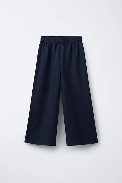 PANTALON INTERLOCK À JAMBES LARGES