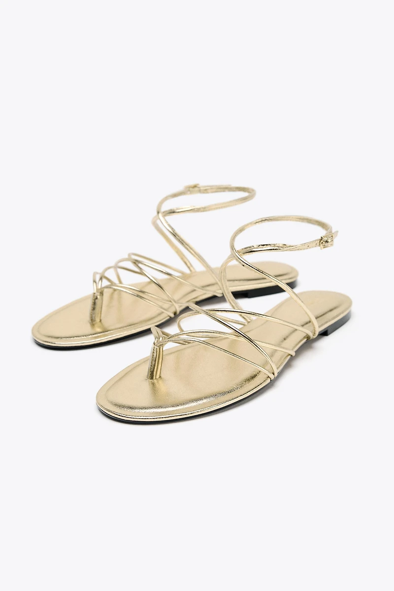 GOLD STRAPPY FLAT SANDALS