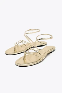 GOLD STRAPPY FLAT SANDALS