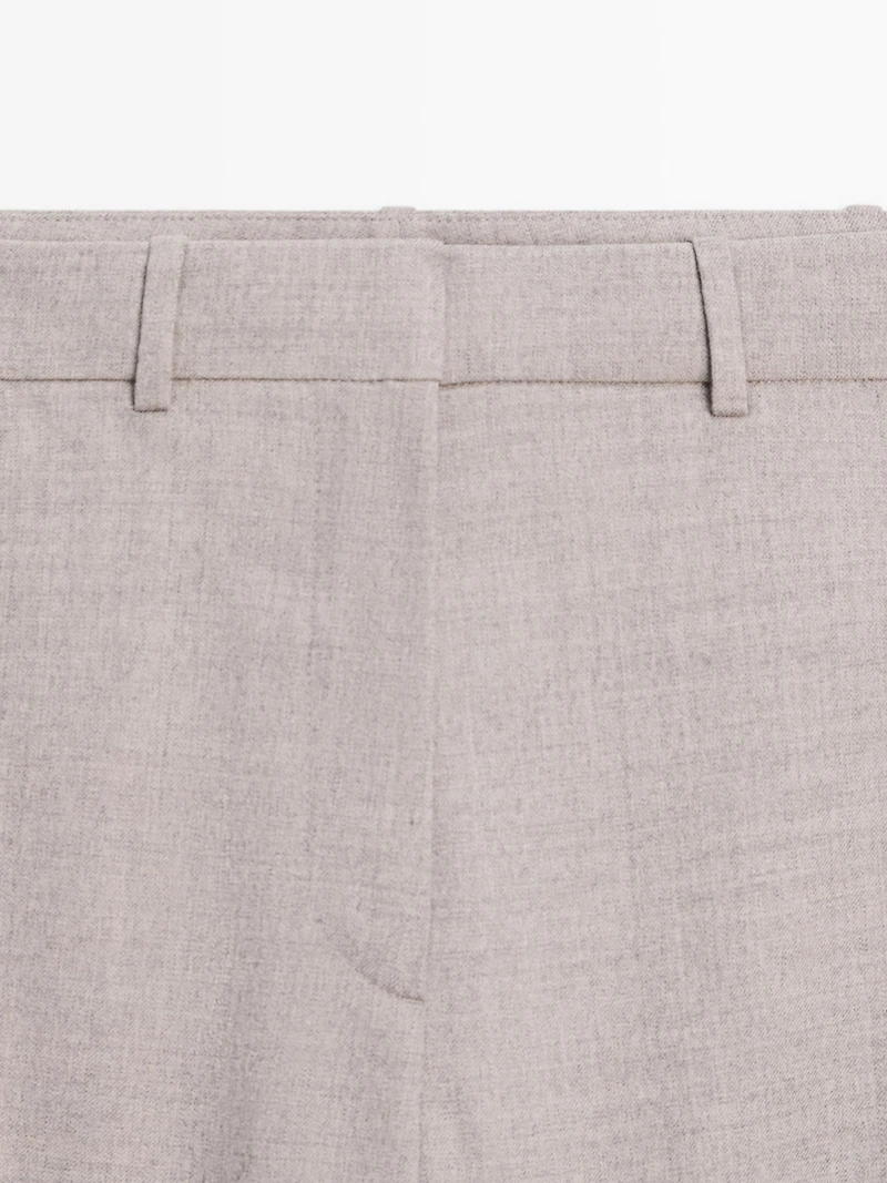Wool blend trousers with buckle detail