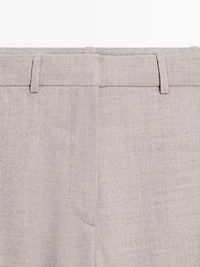 Wool blend trousers with buckle detail