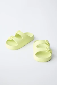 RUBBERIZED BUCKLED SANDALS