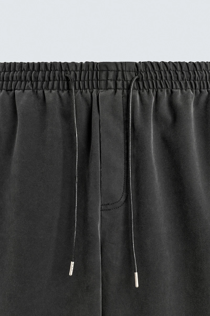 STUDDED FAUX LEATHER RELAXED FIT PANTS