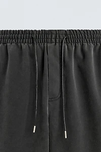 STUDDED FAUX LEATHER RELAXED FIT PANTS