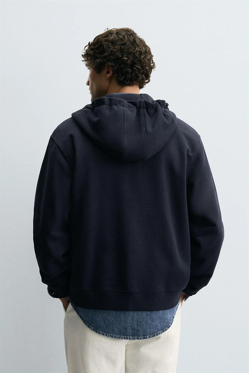 SWEAT ZIPPÉ À CAPUCHE