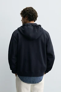 SWEAT ZIPPÉ À CAPUCHE