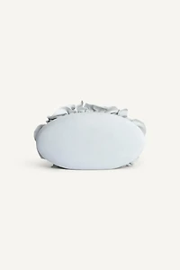LEATHER FLOWER CLUTCH LIMITED EDITION