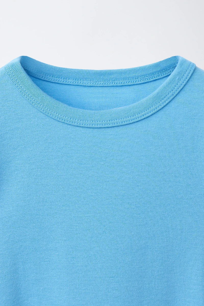 MODAL T-SHIRT WITH CUT OUTS AND BOWS