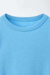 MODAL T-SHIRT WITH CUT OUTS AND BOWS