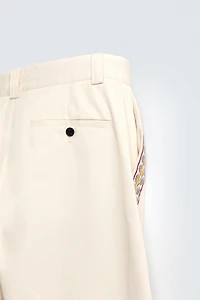 PANTALON BANDE BRODÉE