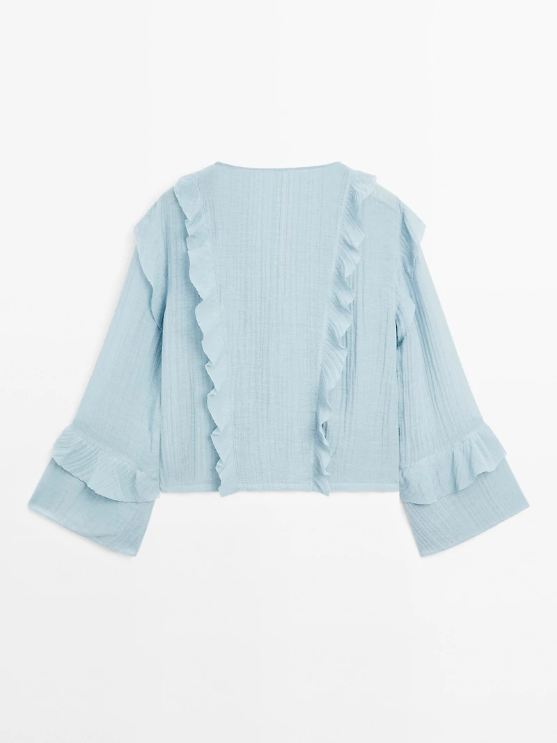 Flowing blouse with ruffles