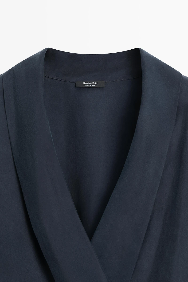 Flowing gathered wrap blouse
