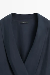 Flowing gathered wrap blouse