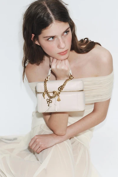 VANITY BAG WITH CHARMS